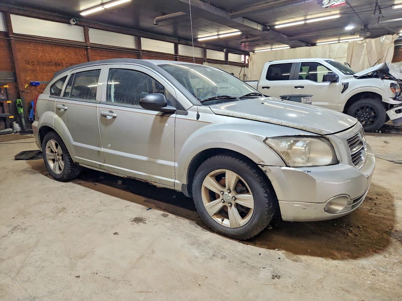 1B3CB9HA7AD598057 · 2010 DODGE CALIBER · 4/14