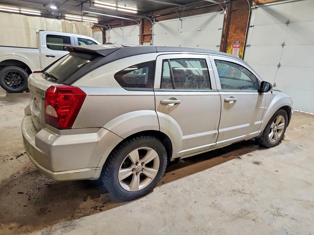1B3CB9HA7AD598057 · 2010 DODGE CALIBER · 3/14