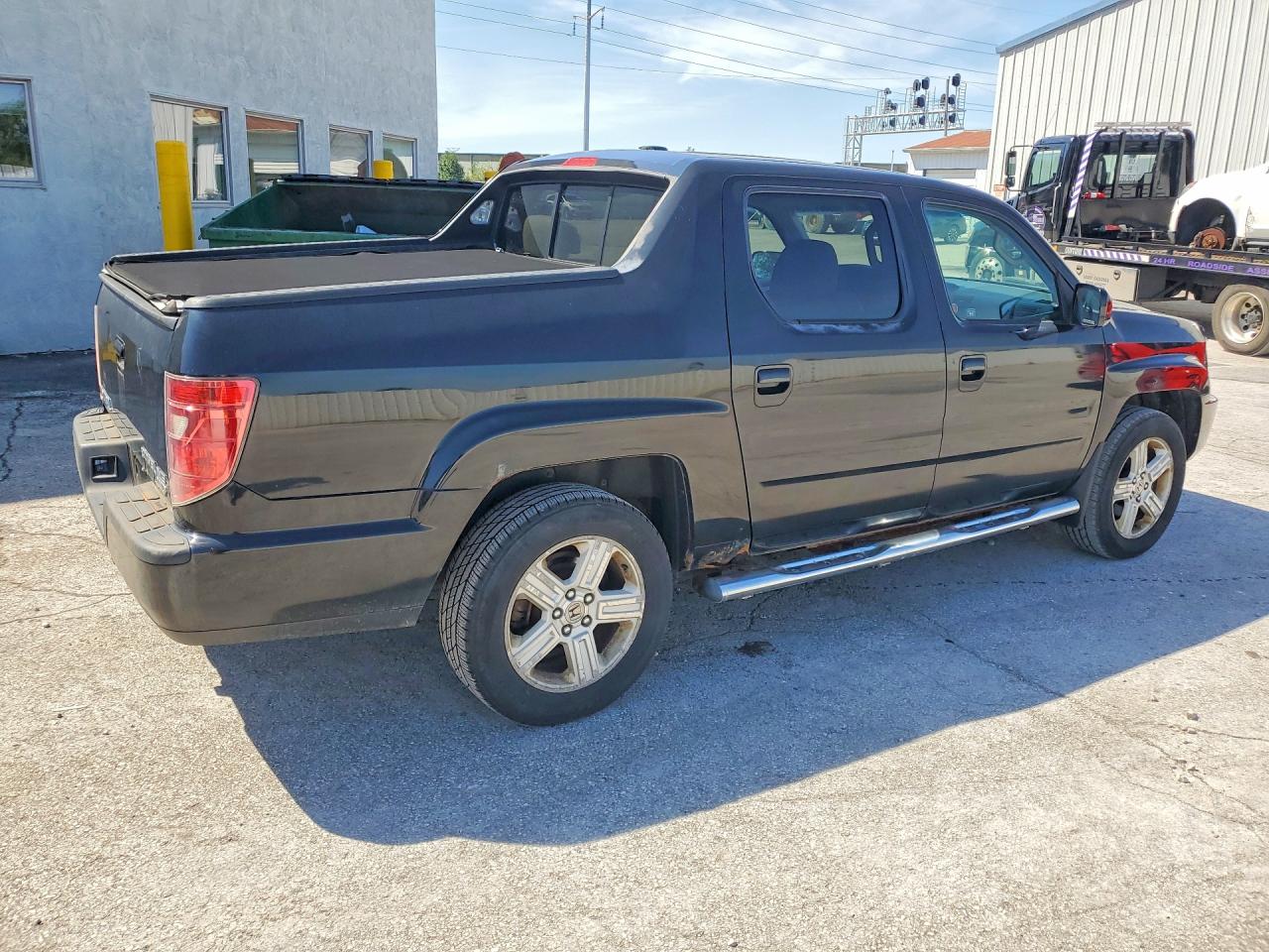 5FPYK1F57BB501193 · 2011 HONDA RIDGELINE · 3/12