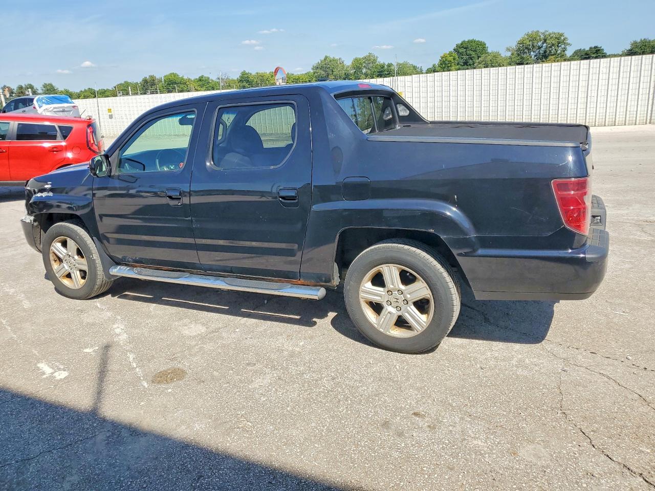 5FPYK1F57BB501193 · 2011 HONDA RIDGELINE · 2/12