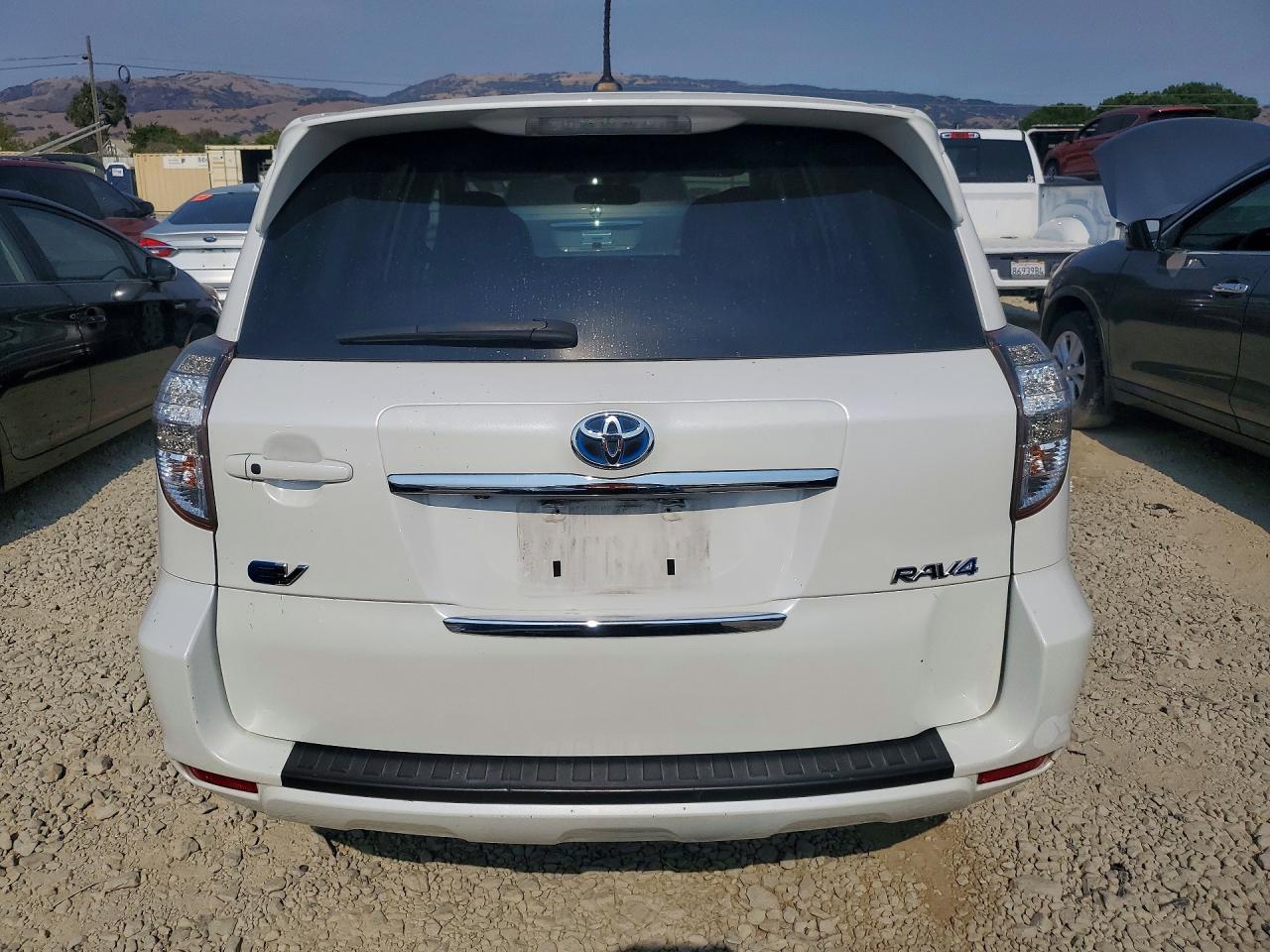 2T3YL4DV6CW001242 · 2012 TOYOTA RAV4 EV · 6/13