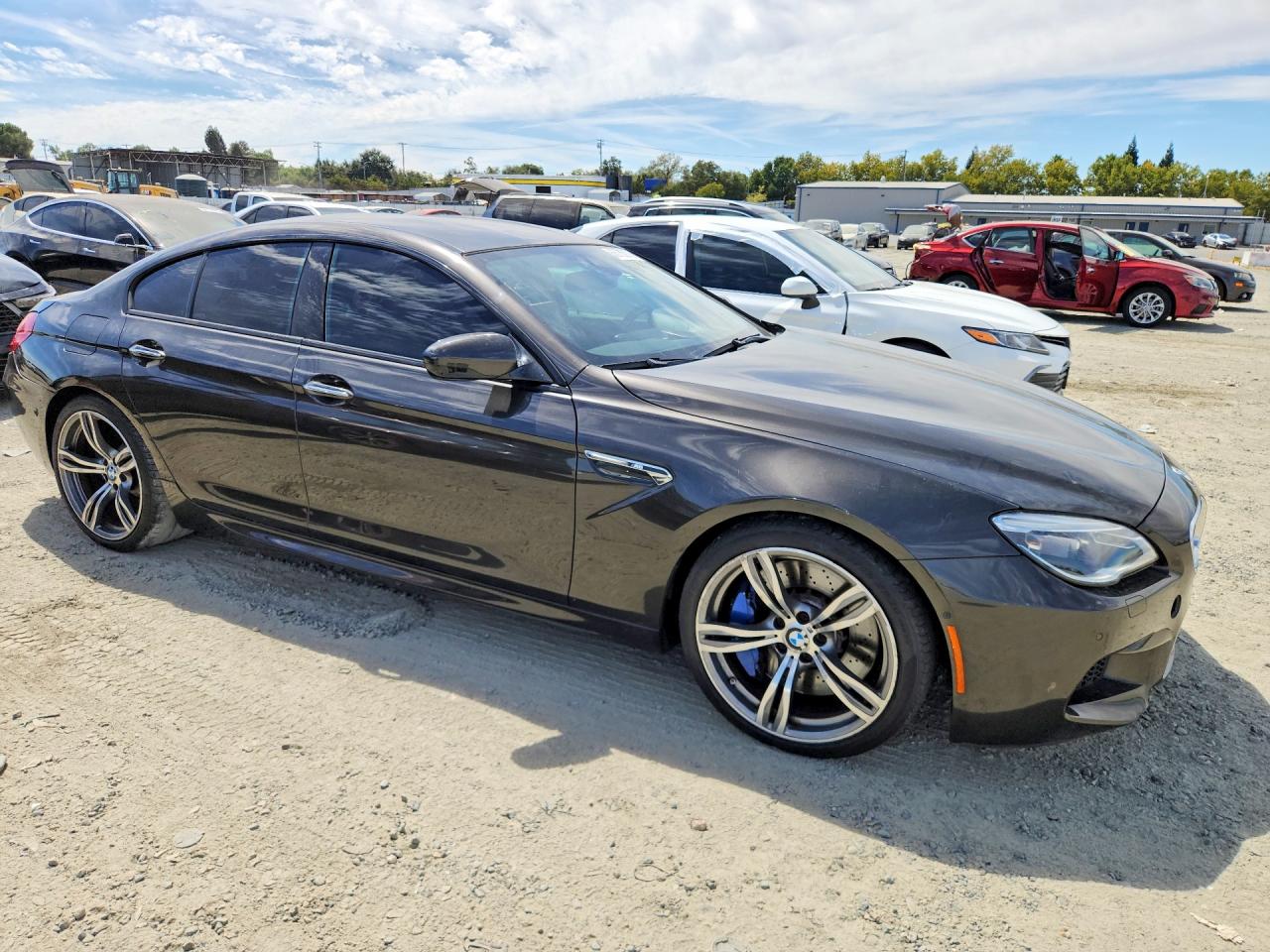 WBS6E9C53GGF92644 · 2016 BMW M6 · 4/12