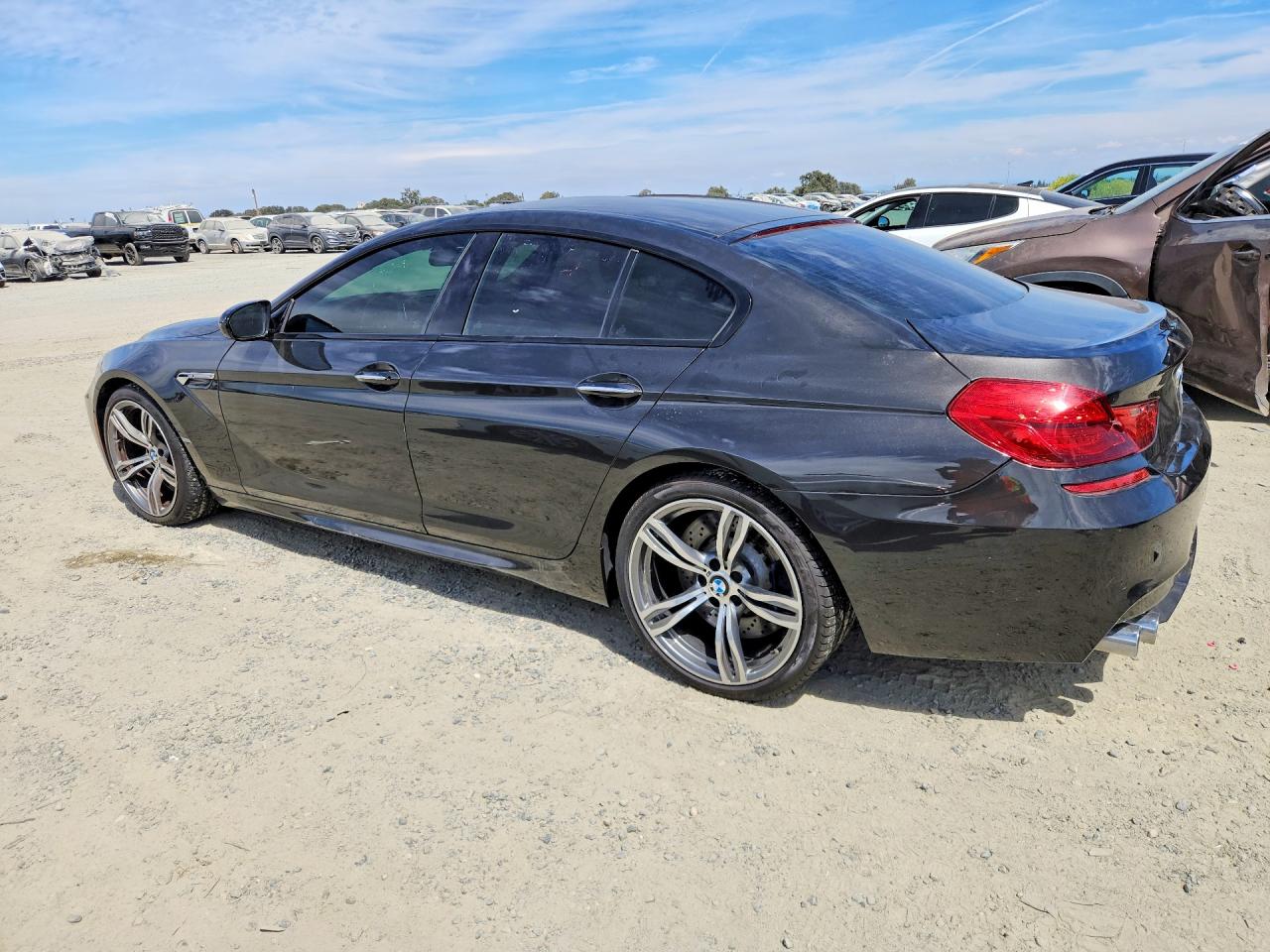 WBS6E9C53GGF92644 · 2016 BMW M6 · 2/12