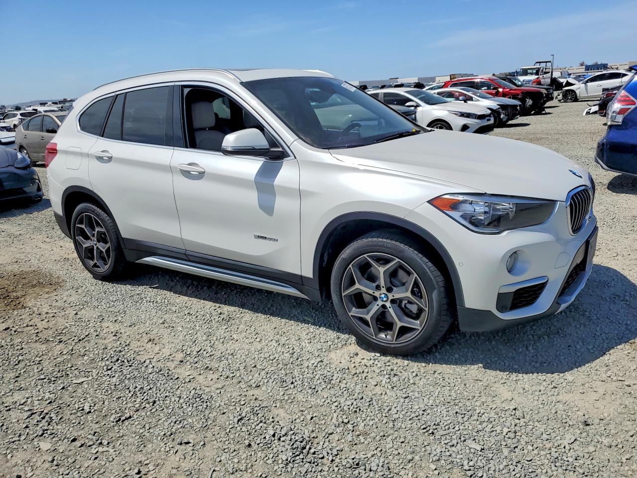 WBXHU7C39J5H44602 · 2018 BMW X1 · 4/12