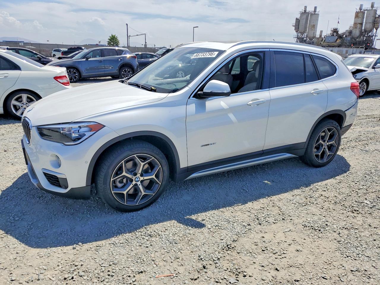 WBXHU7C39J5H44602 · 2018 BMW X1