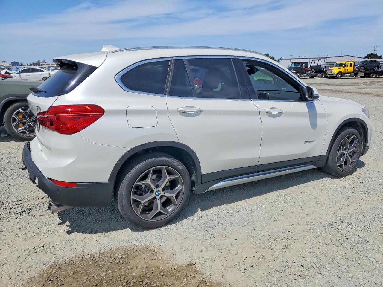 WBXHU7C39J5H44602 · 2018 BMW X1 · 3/12
