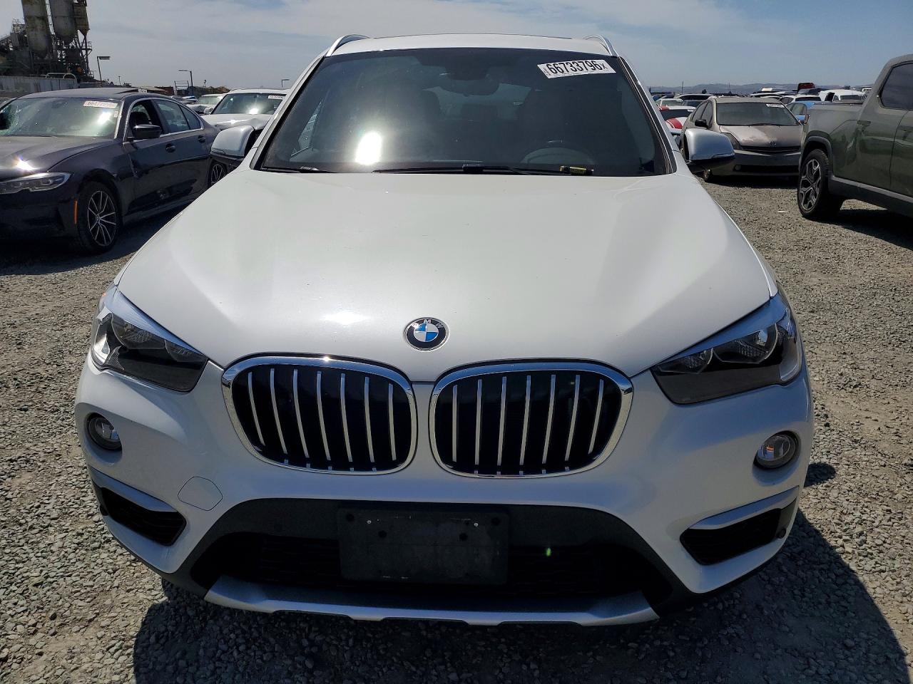 WBXHU7C39J5H44602 · 2018 BMW X1 · 5/12