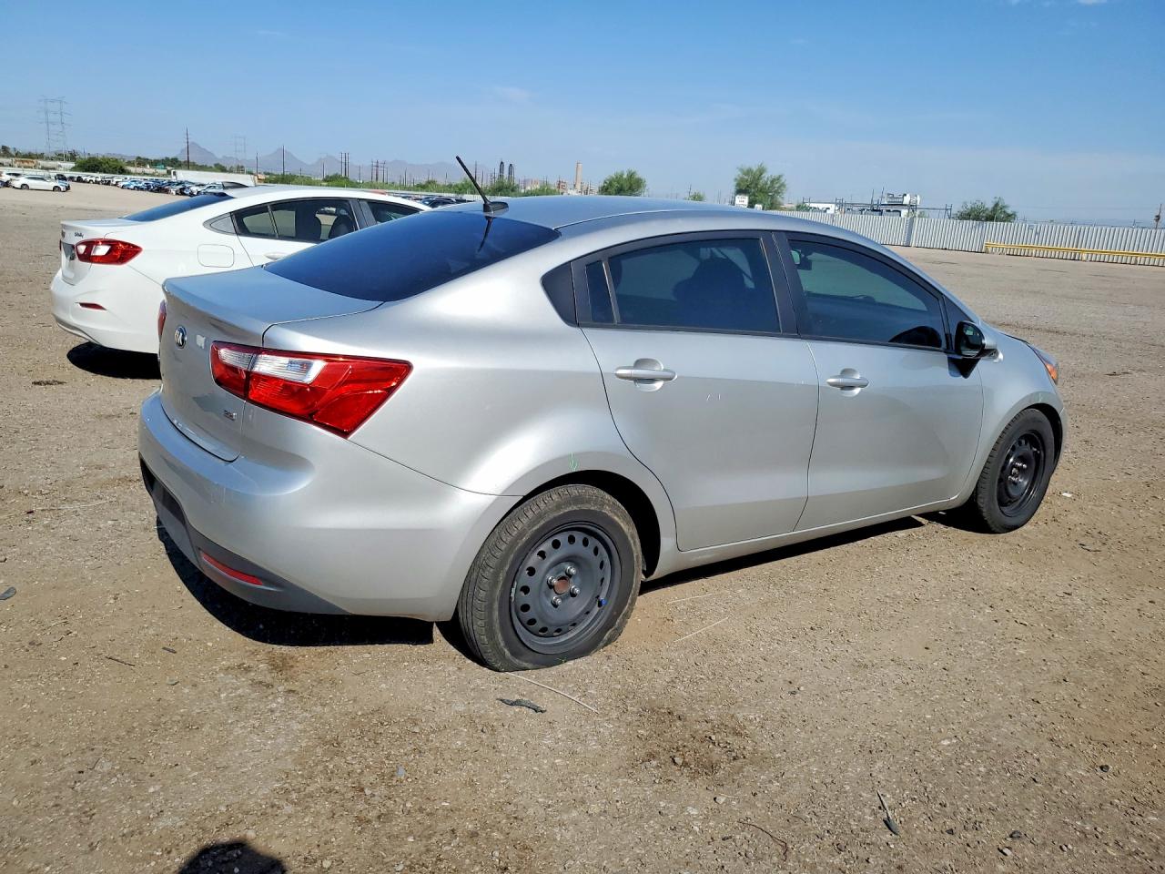 KNADM4A31E6352737 · 2014 KIA RIO · 3/12