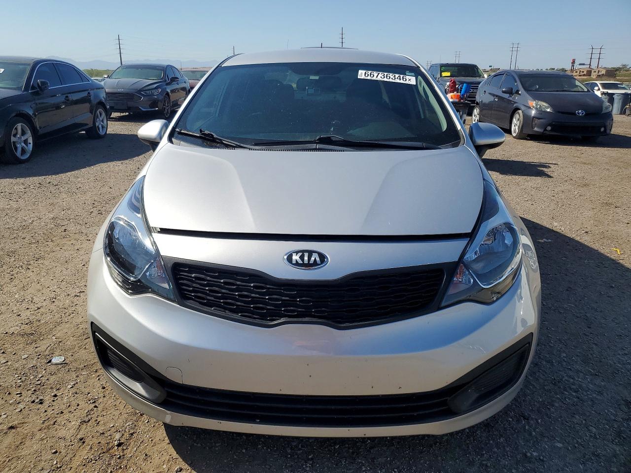 KNADM4A31E6352737 · 2014 KIA RIO · 5/12
