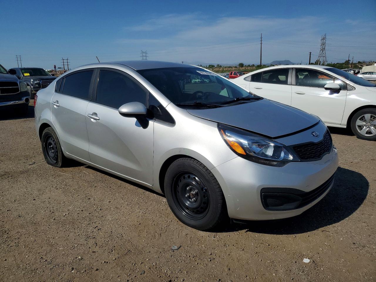 KNADM4A31E6352737 · 2014 KIA RIO · 4/12