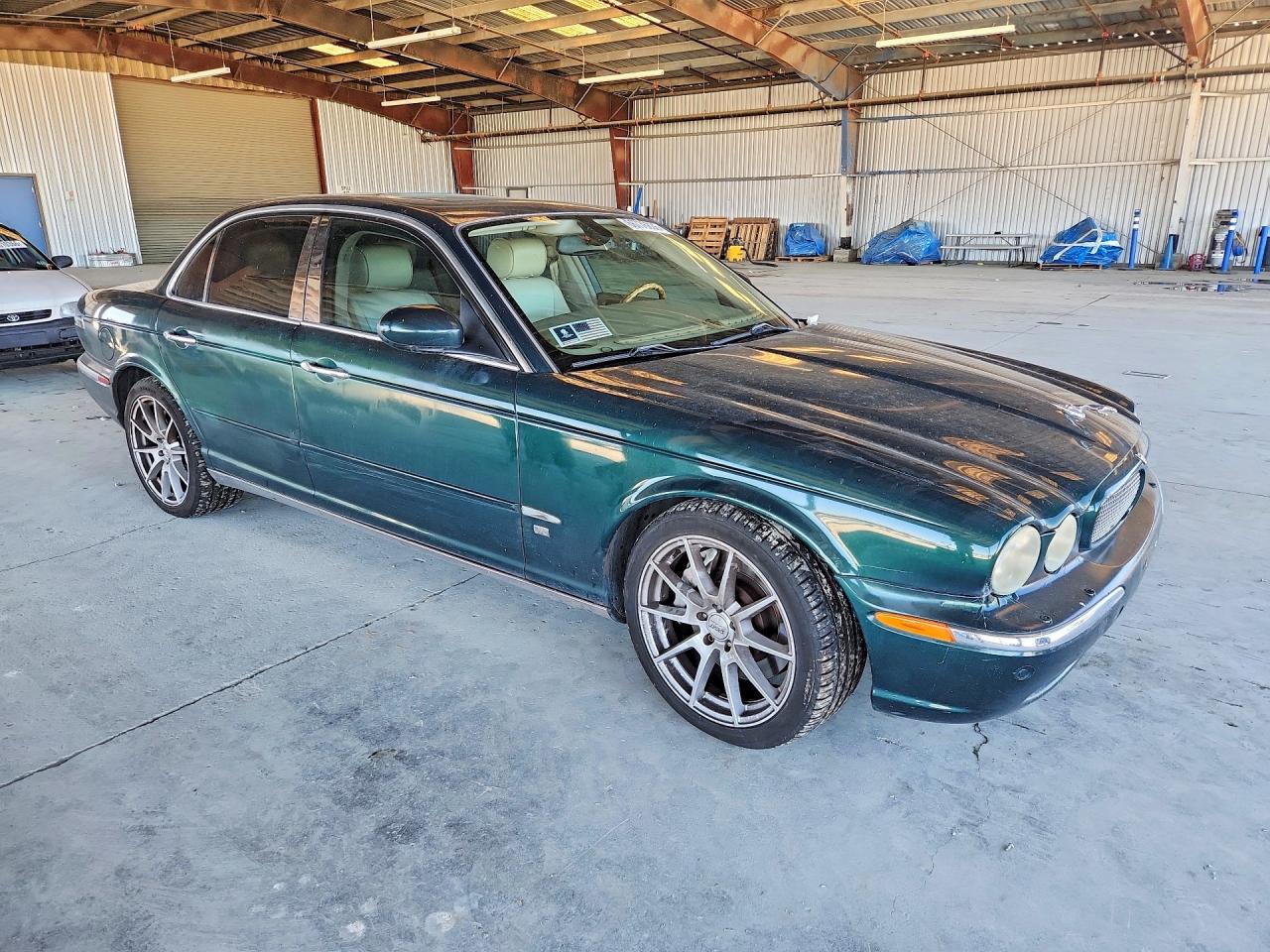 SAJWA73B24TG30933 · 2004 JAGUAR XJR · 4/12