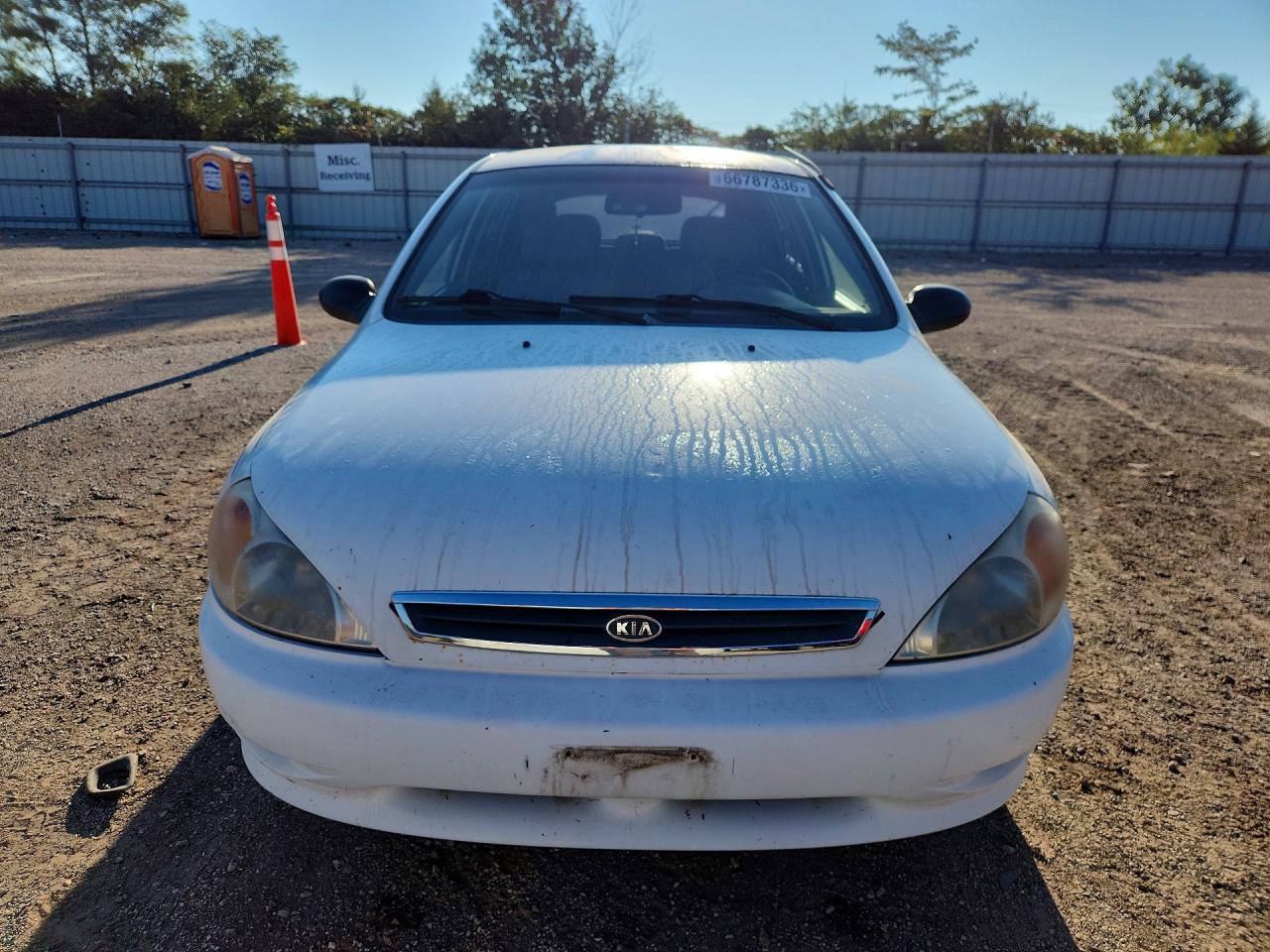 KNADC163126054694 · 2002 KIA RIO · 5/12