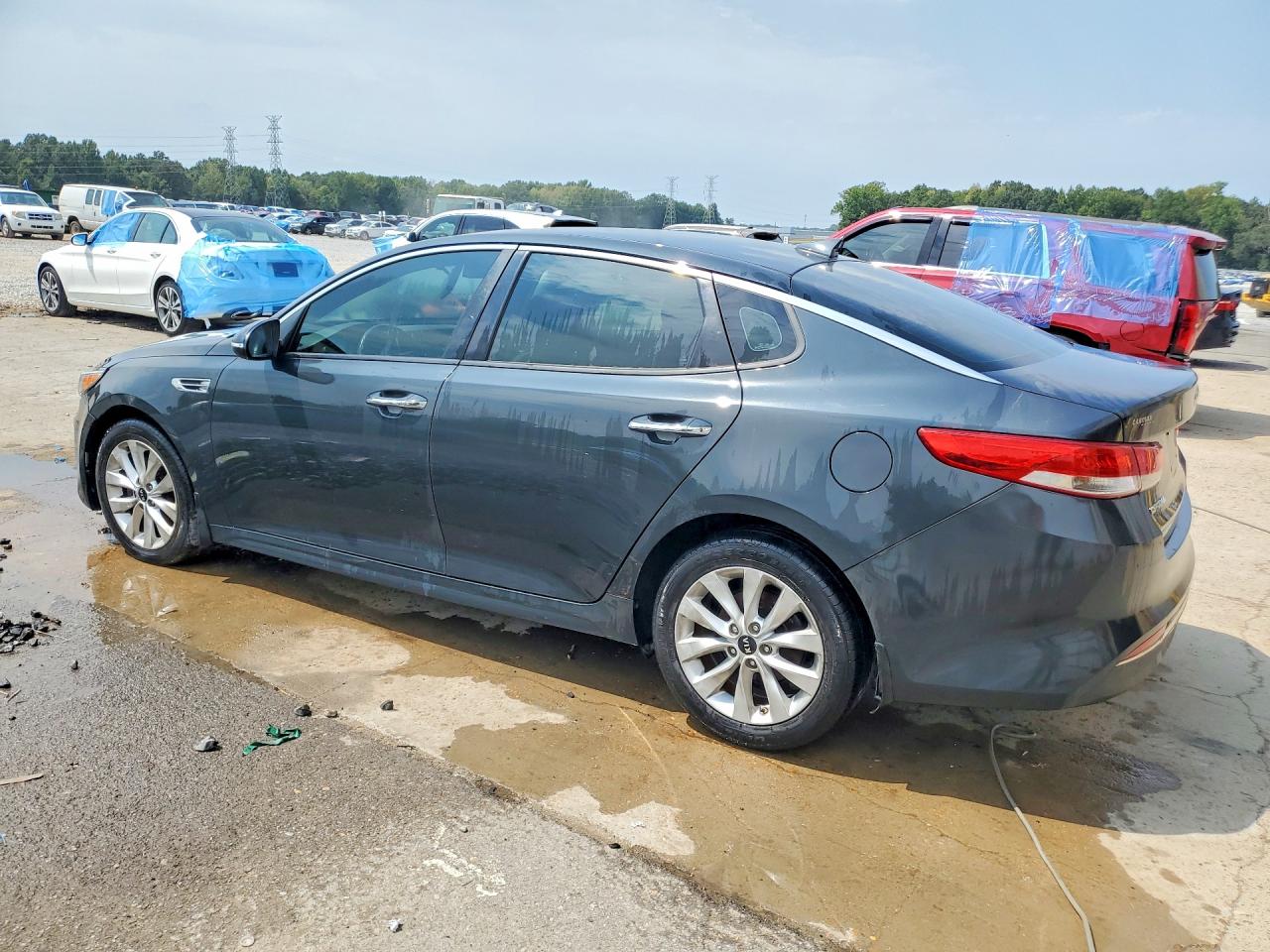 5XXGU4L39GG094677 · 2016 KIA OPTIMA · 2/12
