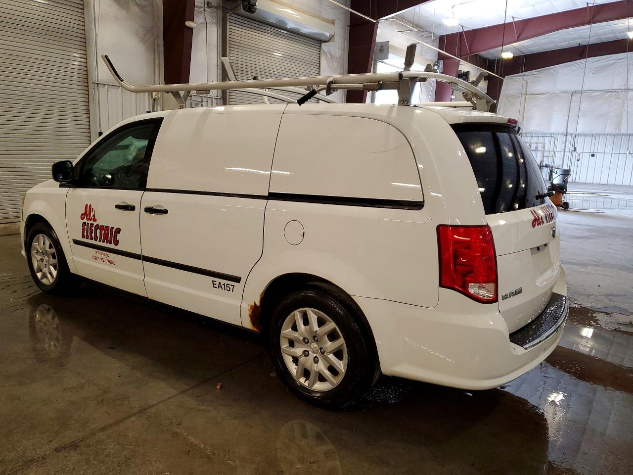2C4JRGAG8ER278107 · 2014 RAM TRADESMAN · 2/13