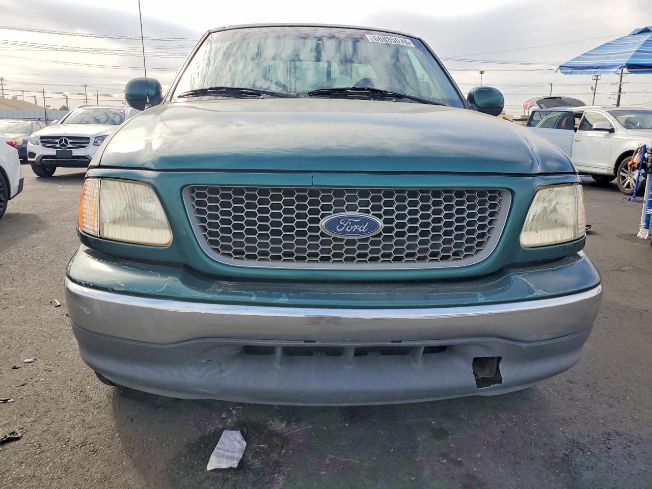 1FTRX17W4XKB50338 · 1999 FORD F150 · 5/12