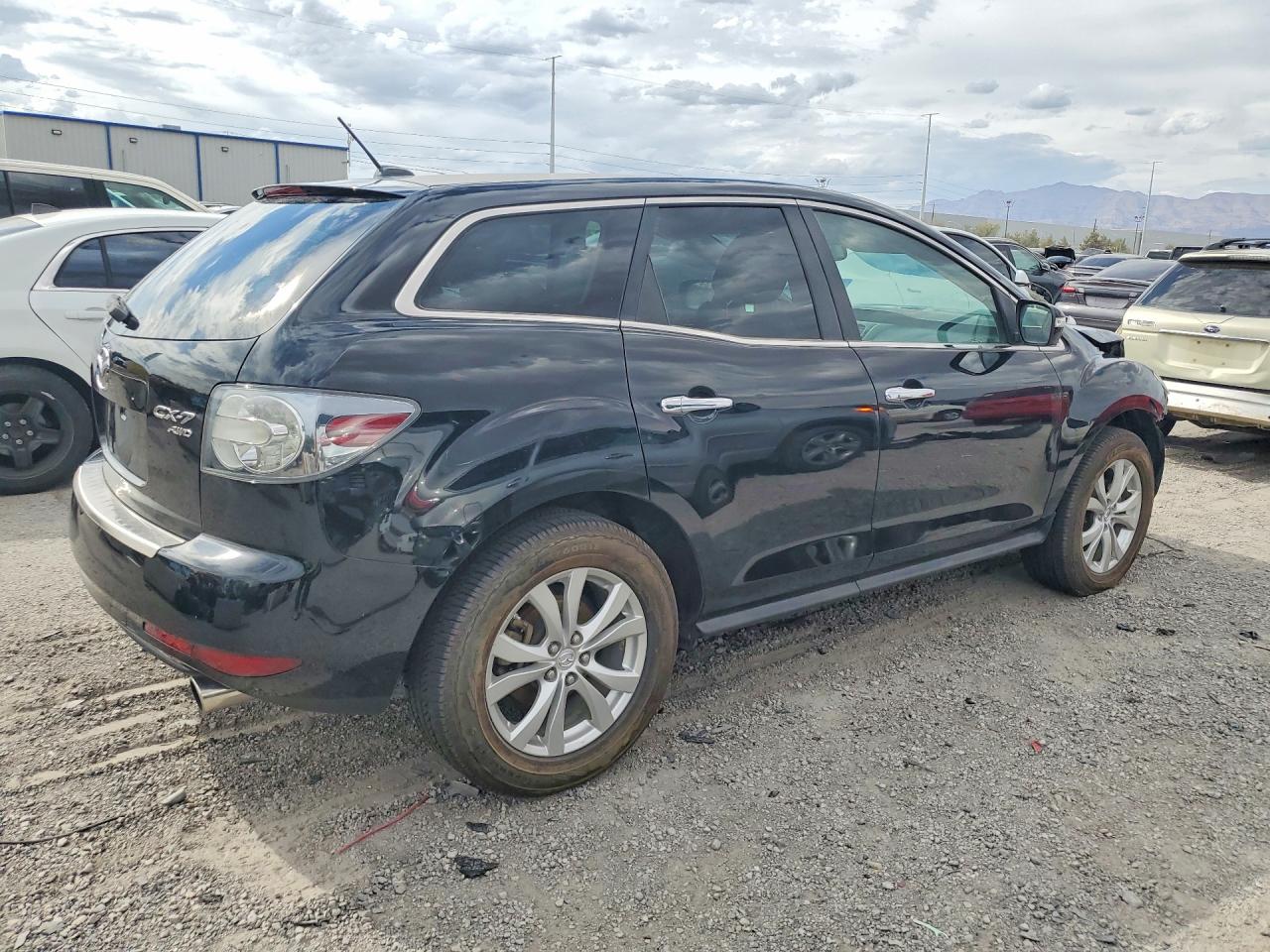 JM3ER4D32B0378497 · 2011 MAZDA CX-7 · 3/14