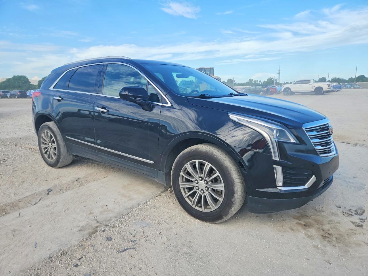 1GYKNDRS6KZ272230 · 2019 CADILLAC XT5 · 4/13