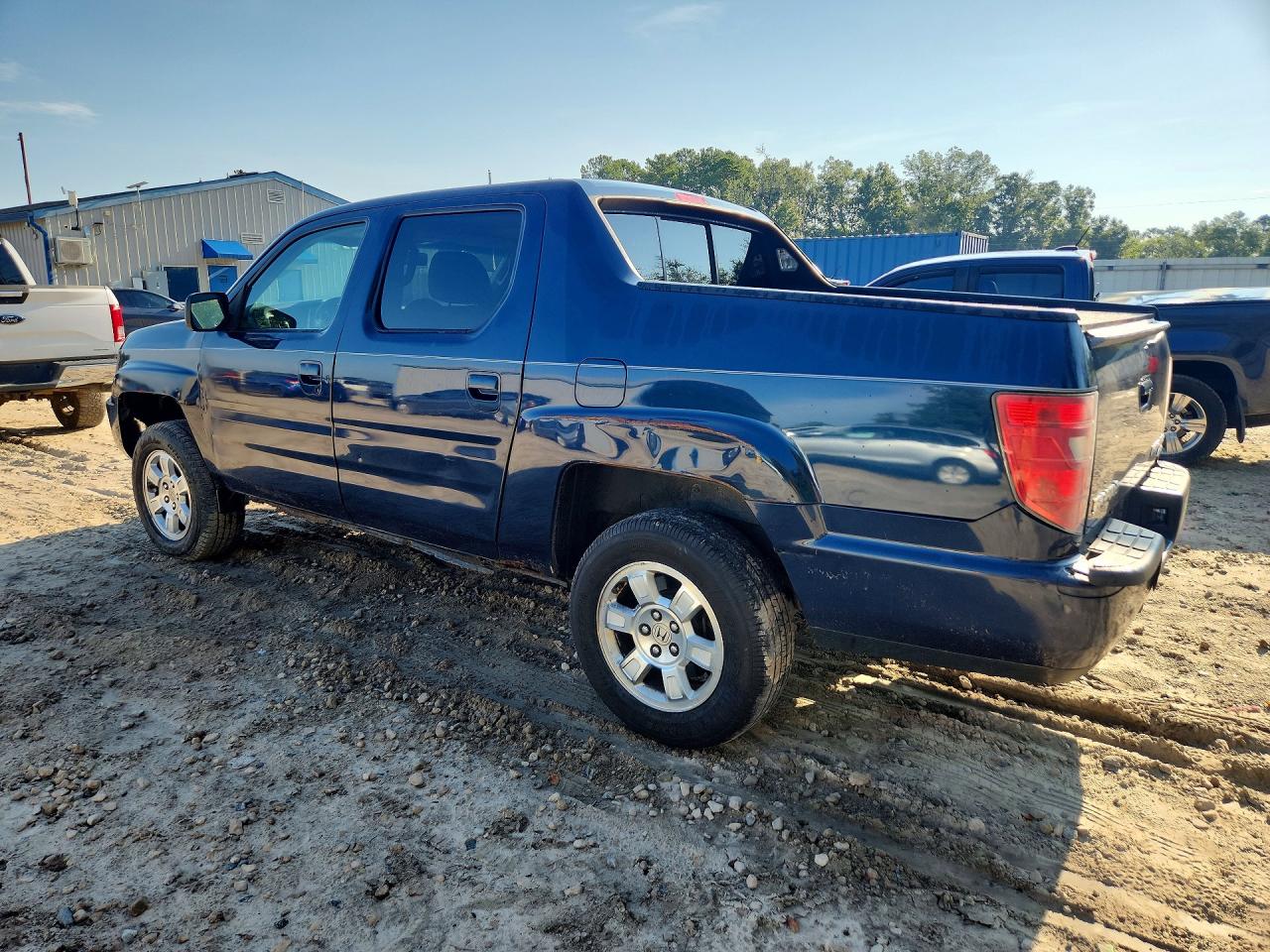 5FPYK1F59AB002457 · 2010 HONDA RIDGELINE · 2/12