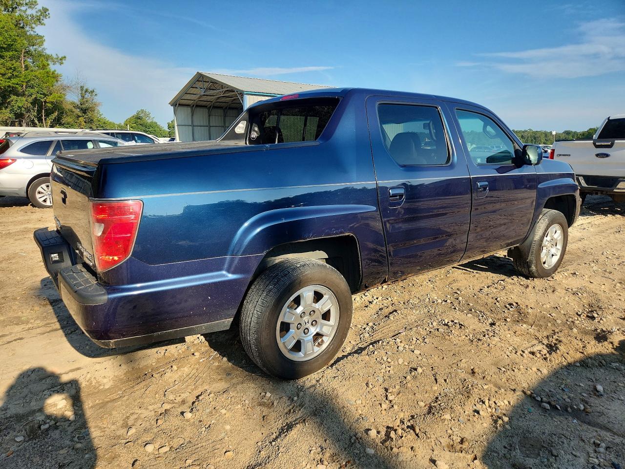 5FPYK1F59AB002457 · 2010 HONDA RIDGELINE · 3/12