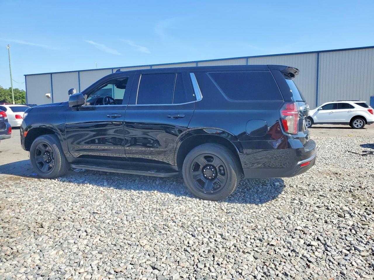 1GNSCLED1PR256593 · 2023 CHEVROLET TAHOE · 2/13