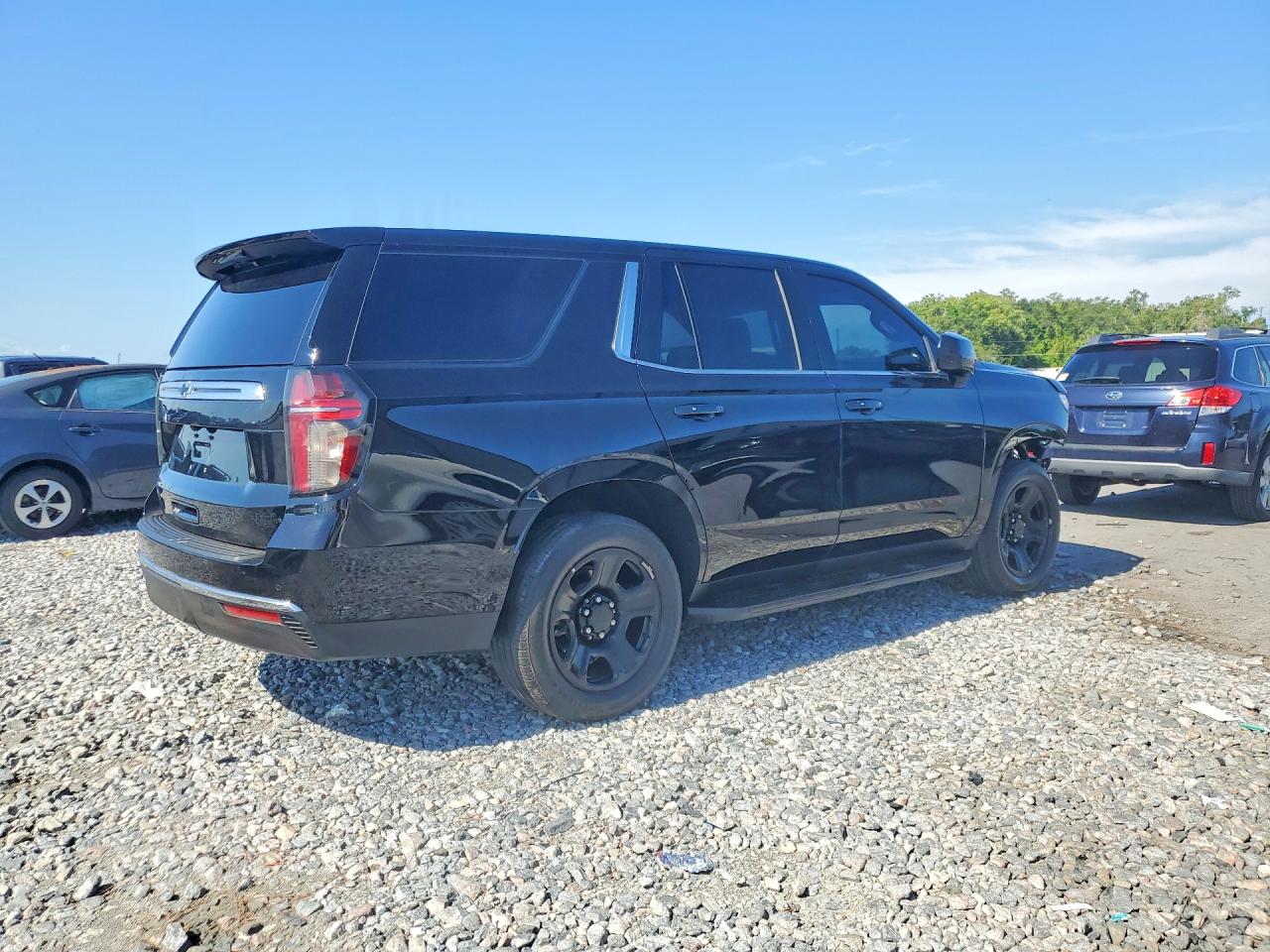 1GNSCLED1PR256593 · 2023 CHEVROLET TAHOE · 3/13
