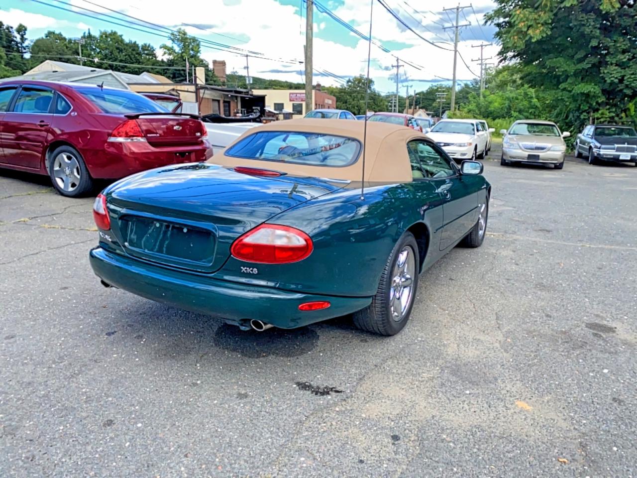 SAJGX2049XC038524 · 1999 JAGUAR XK8 · 4/10
