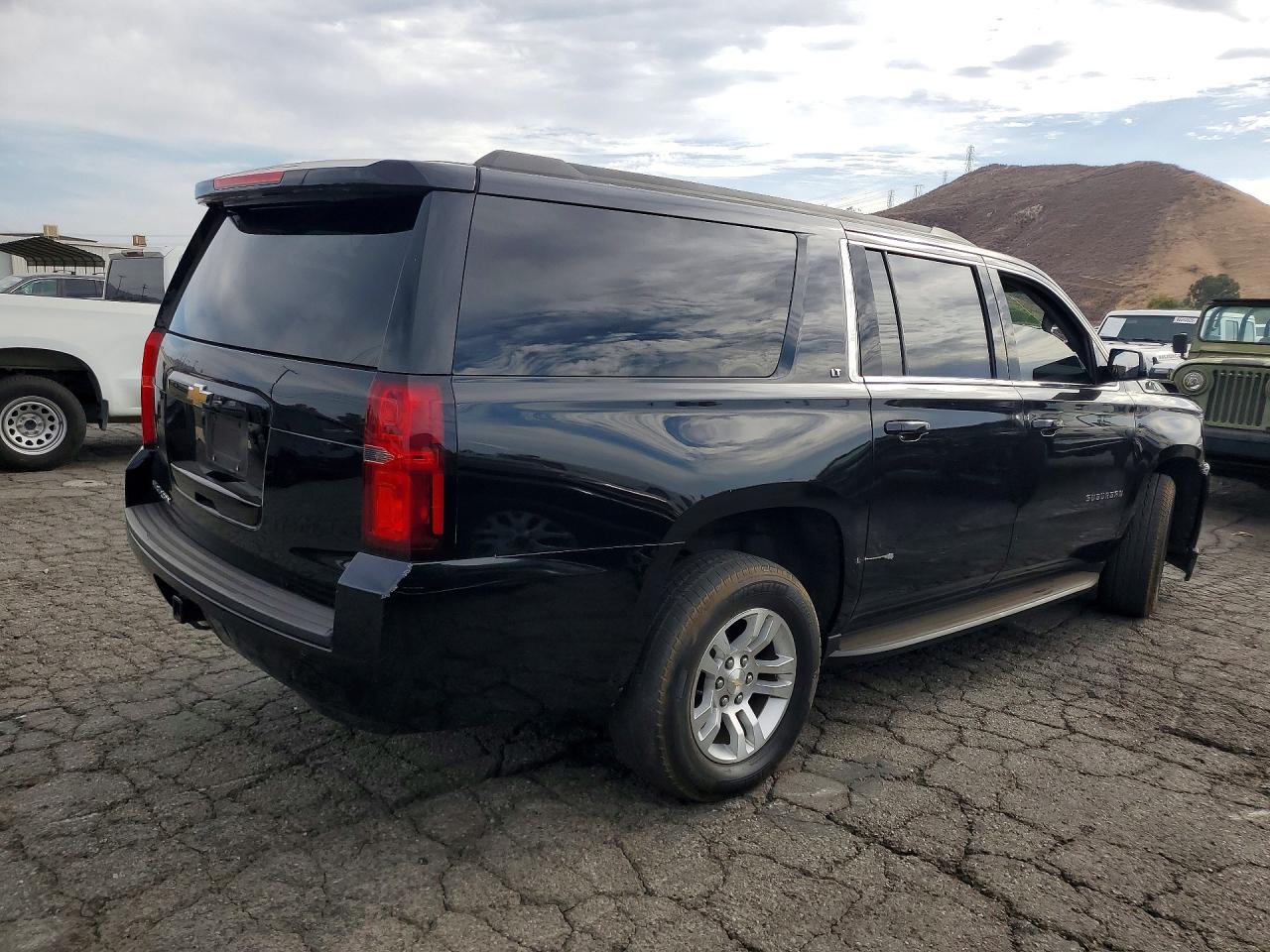 1GNSCHKC5KR168955 · 2019 CHEVROLET SUBURBAN · 3/13