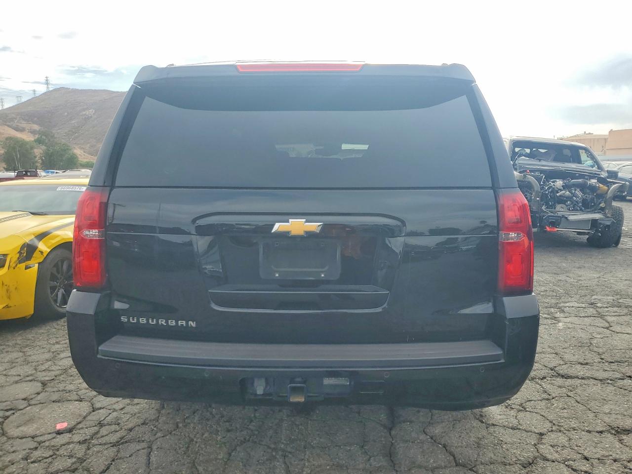 1GNSCHKC5KR168955 · 2019 CHEVROLET SUBURBAN · 6/13