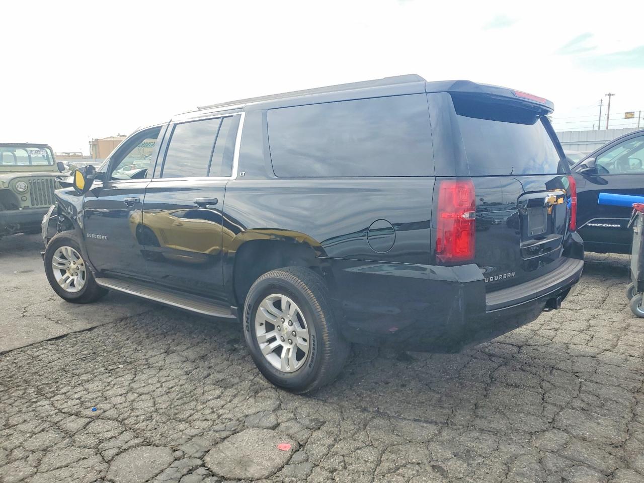 1GNSCHKC5KR168955 · 2019 CHEVROLET SUBURBAN · 2/13