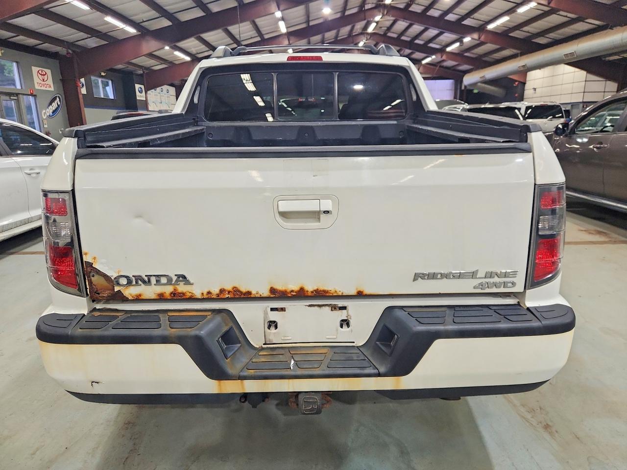 5FPYK1F77EB009706 · 2014 HONDA RIDGELINE · 6/12