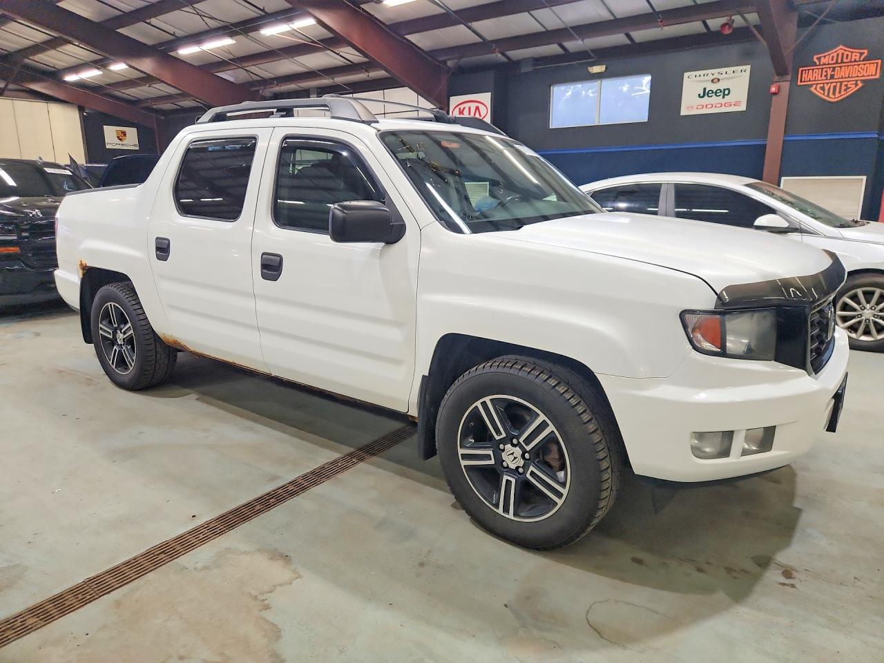 5FPYK1F77EB009706 · 2014 HONDA RIDGELINE · 4/12