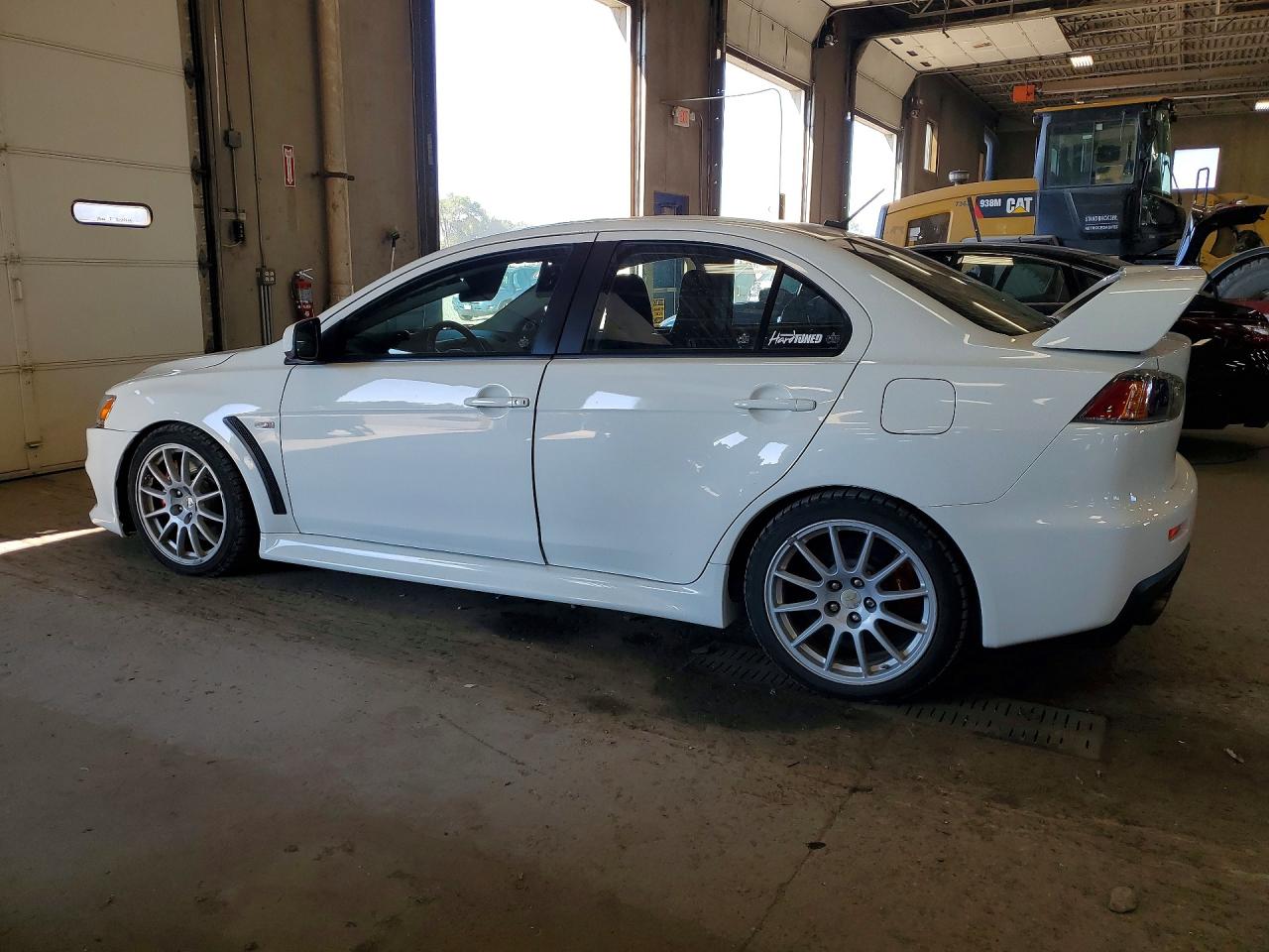 JA32W8FV8AU007926 · 2010 MITSUBISHI LANCER · 2/12