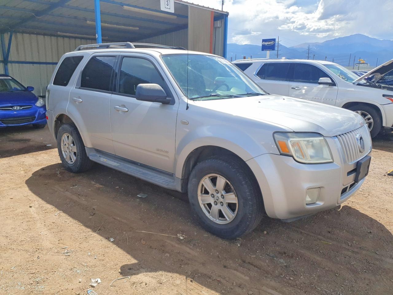 4M2CU91118KJ53512 · 2008 MERCURY MARINER · 4/13