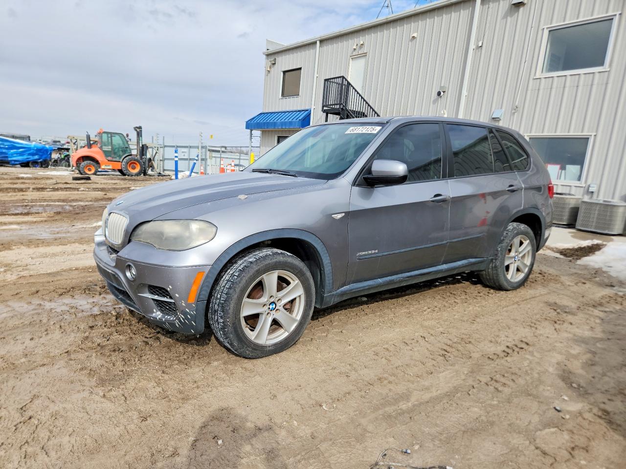5UXZW0C54BL657610 · 2011 BMW X5