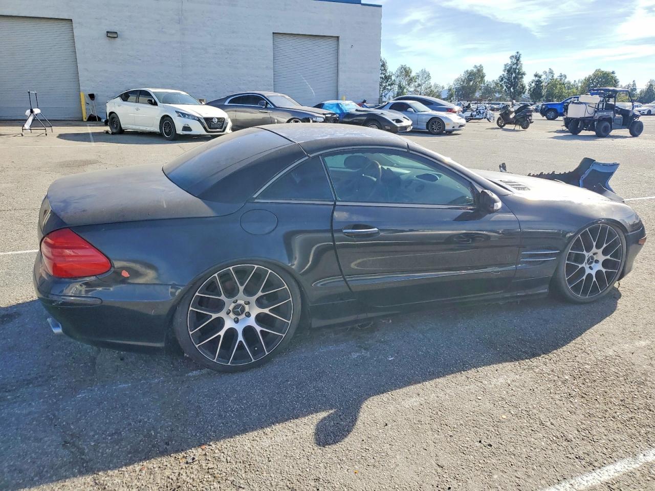 WDBSK75F53F037134 · 2003 MERCEDES-BENZ SL · 3/12