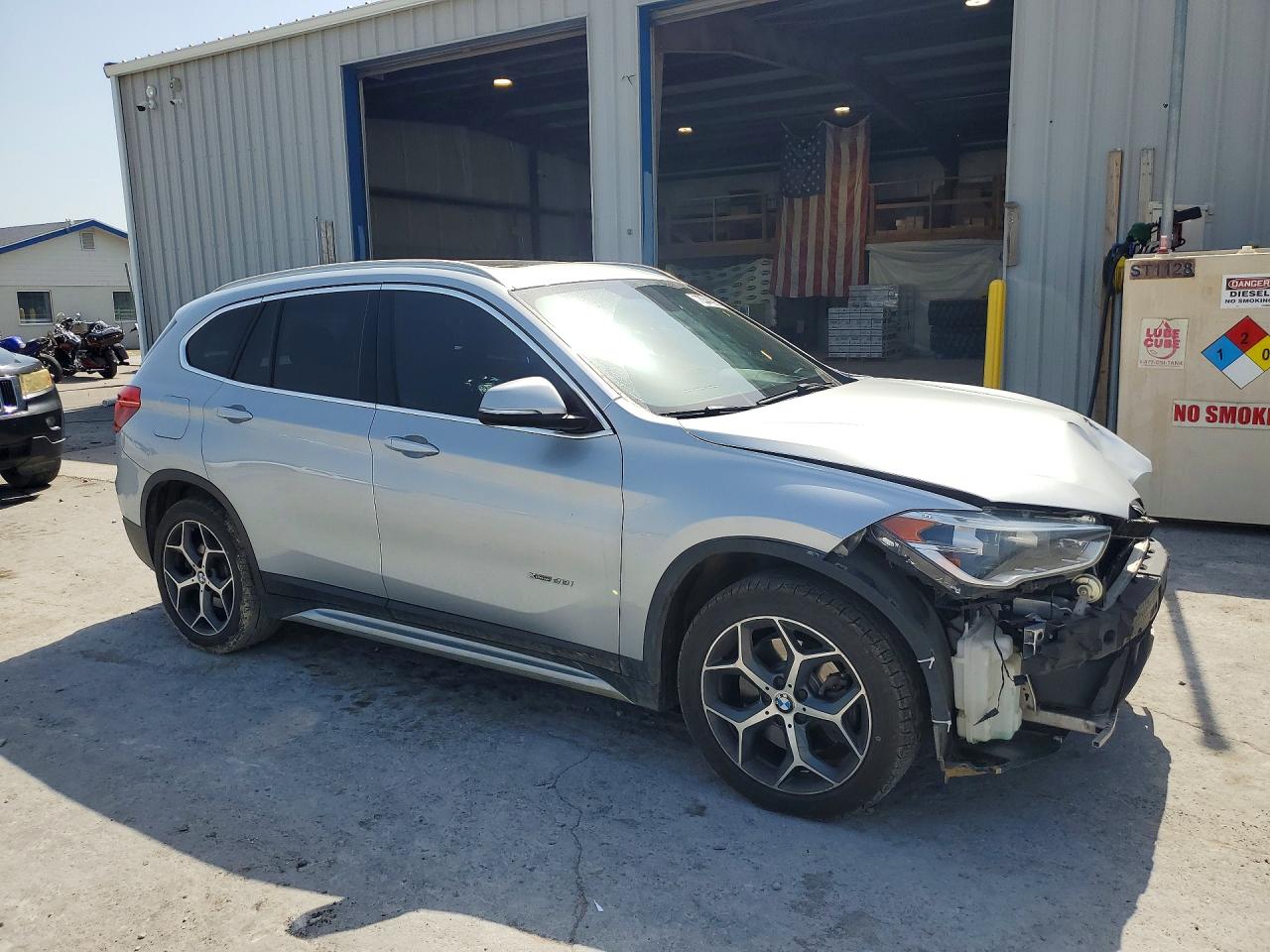 WBXHT3C38J5K26926 · 2018 BMW X1 · 4/13
