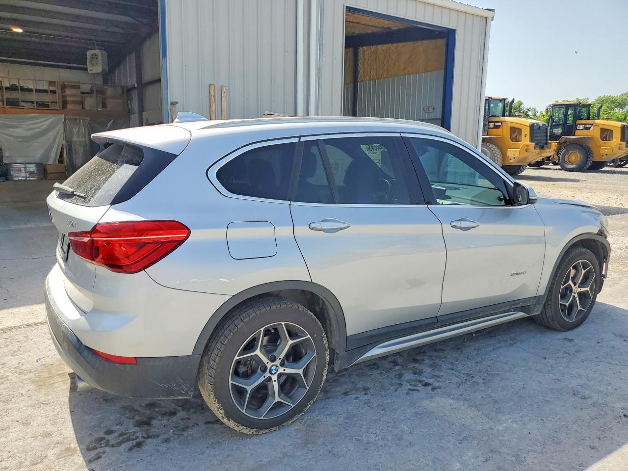 WBXHT3C38J5K26926 · 2018 BMW X1 · 3/13