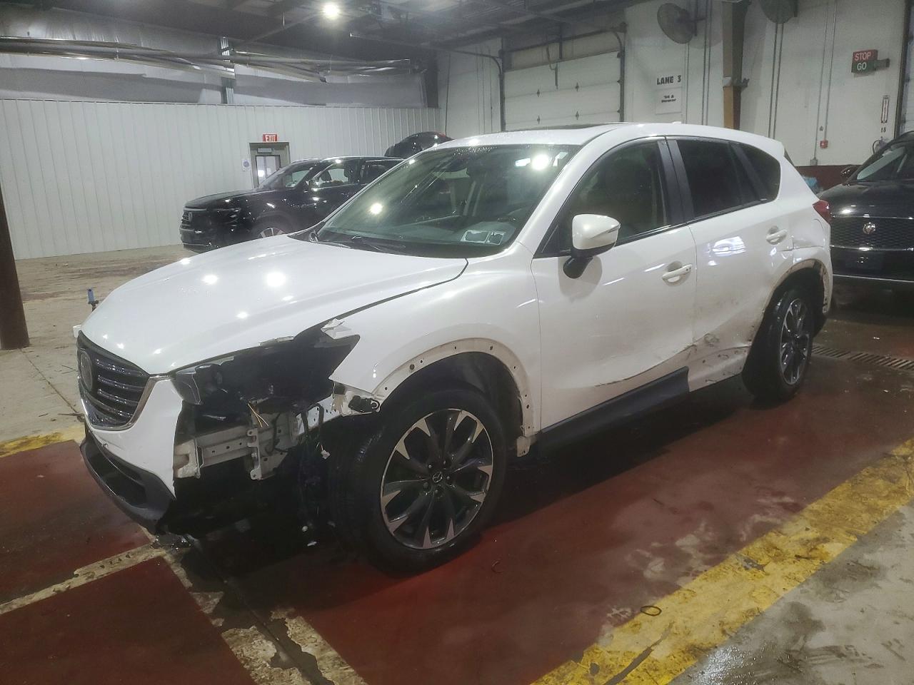 JM3KE4DY2G0749711 · 2016 MAZDA CX-5