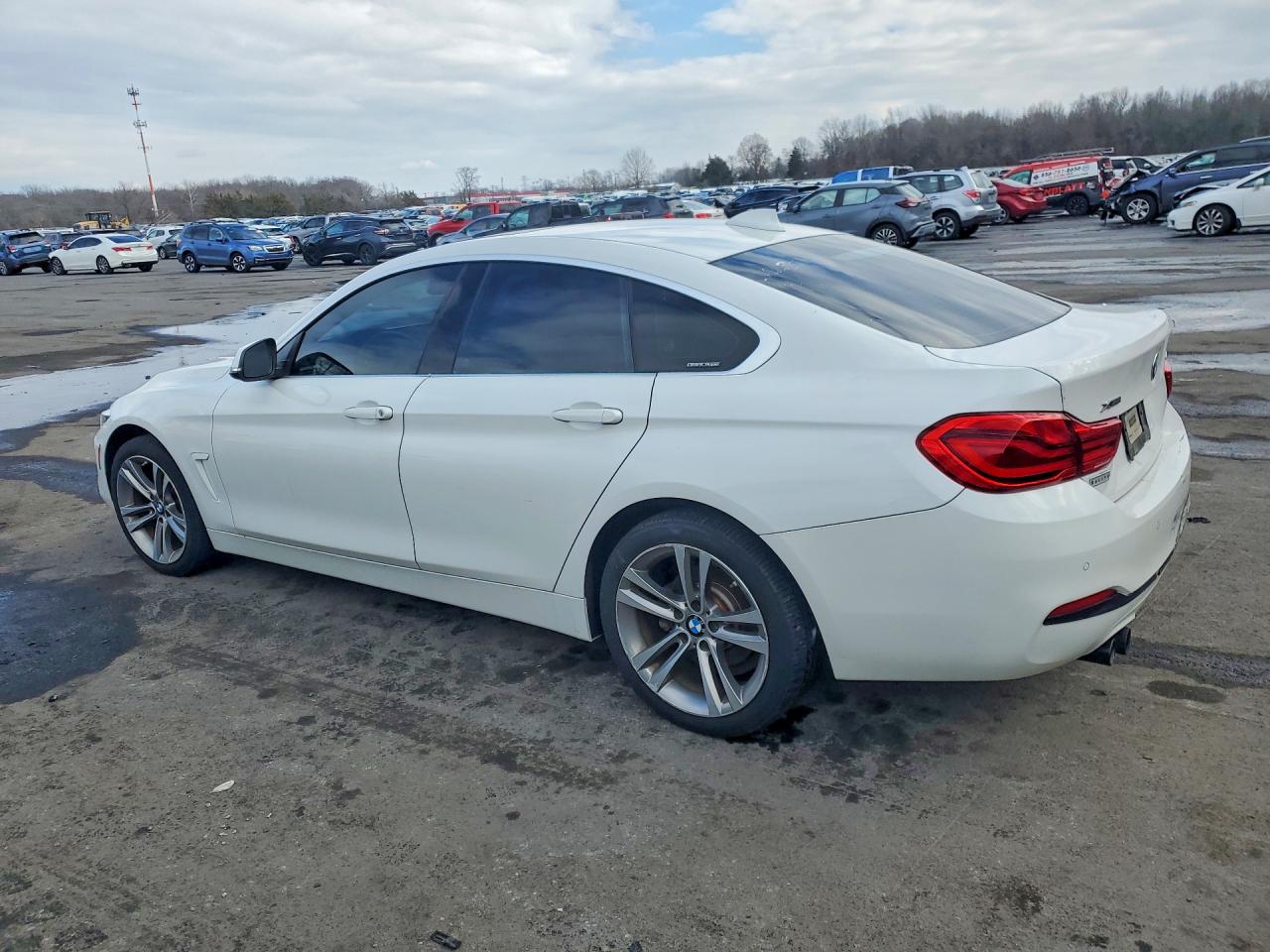 WBA4J3C56KBL08737 · 2019 BMW 430XI · 2/12