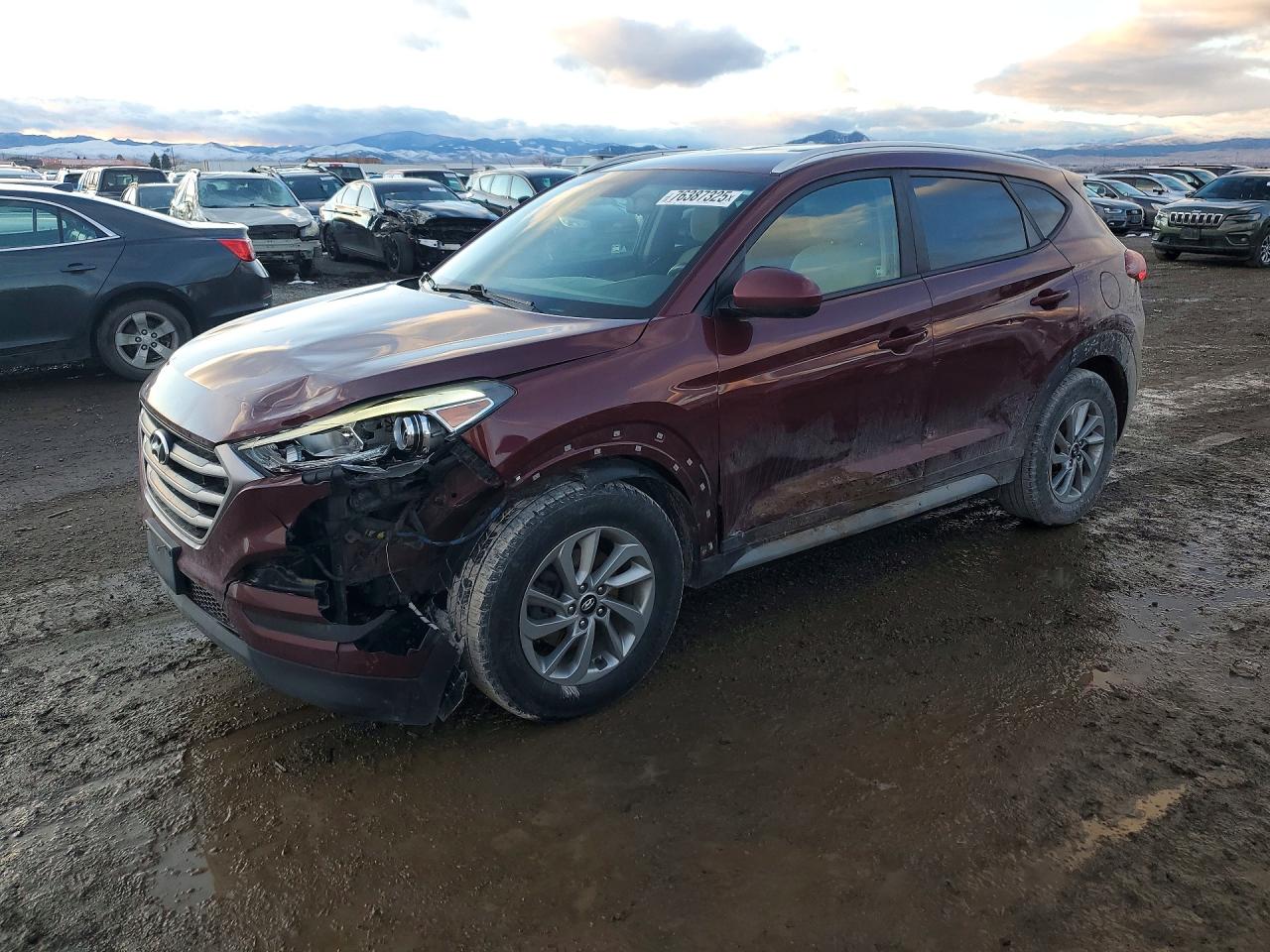 KM8J3CA47JU599211 · 2018 HYUNDAI TUCSON