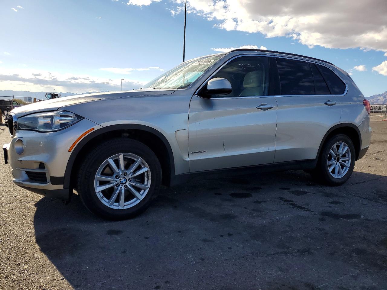 5UXKR2C50E0H33935 · 2014 BMW X5