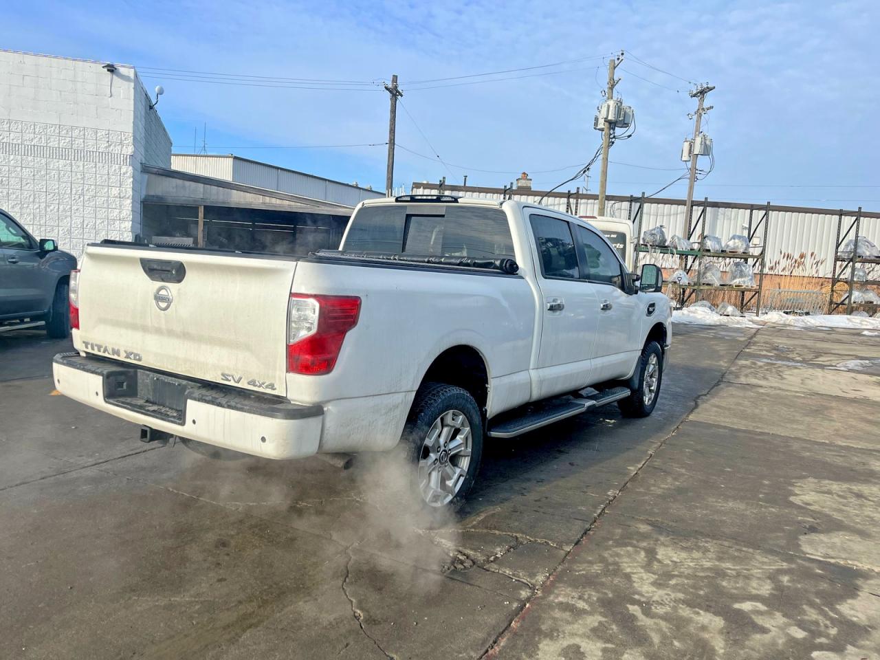 1N6AA1FB9LN511291 · 2020 NISSAN TITAN XD · 4/10