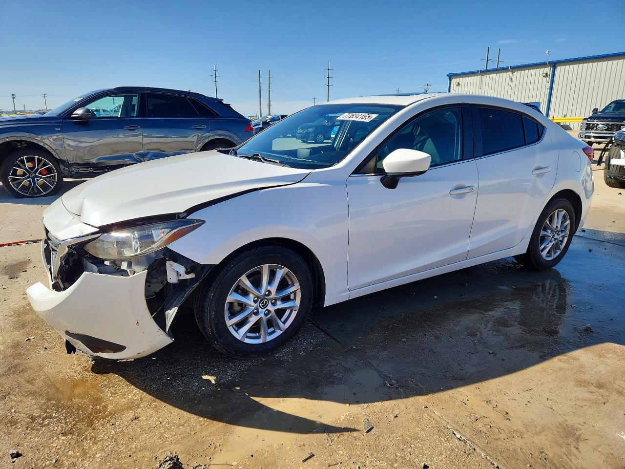 JM1BM1X7XG1317682 · 2016 MAZDA 3