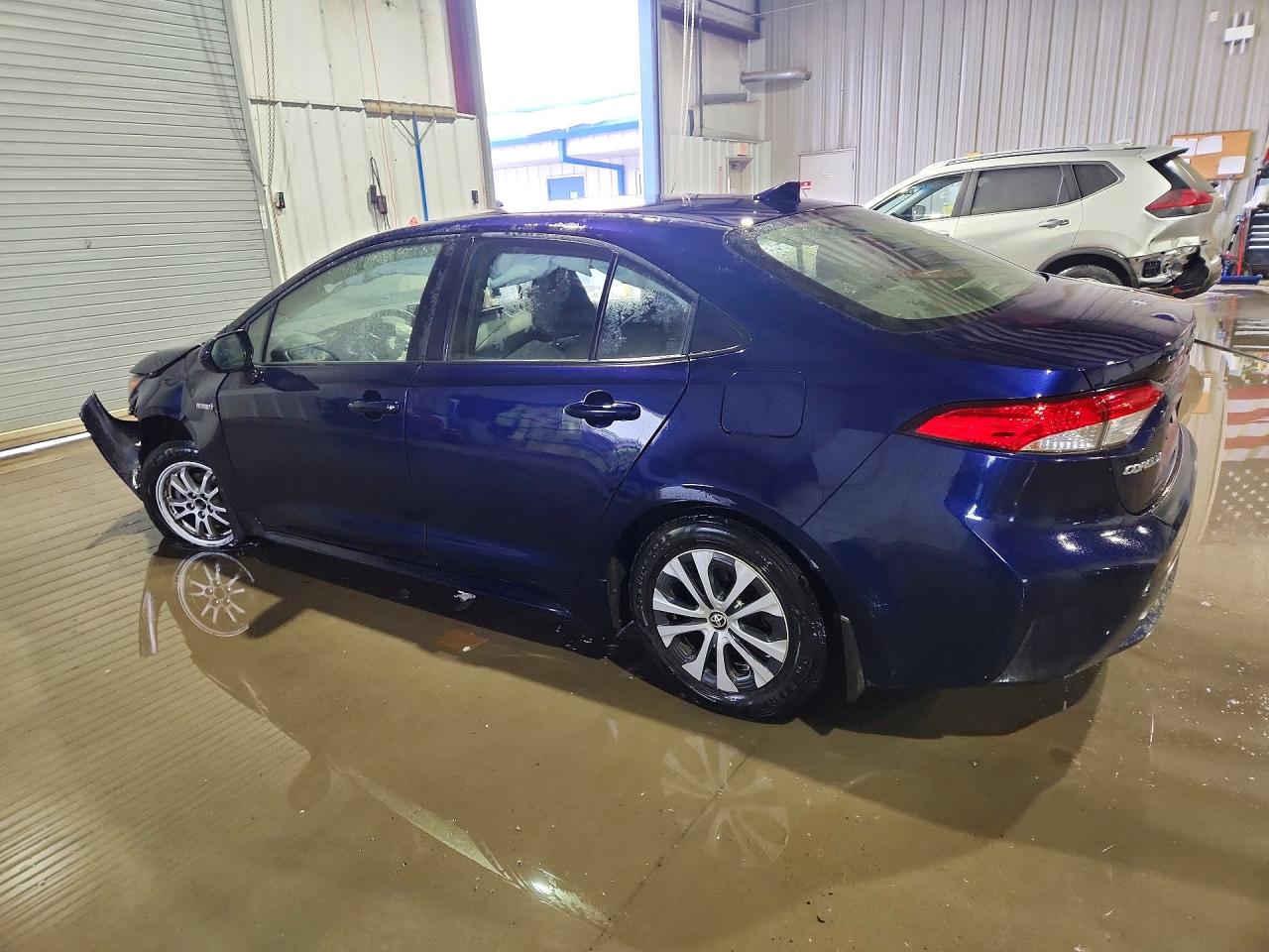 JTDEAMDE2MJ028124 · 2021 TOYOTA COROLLA HYBRID · 2/12