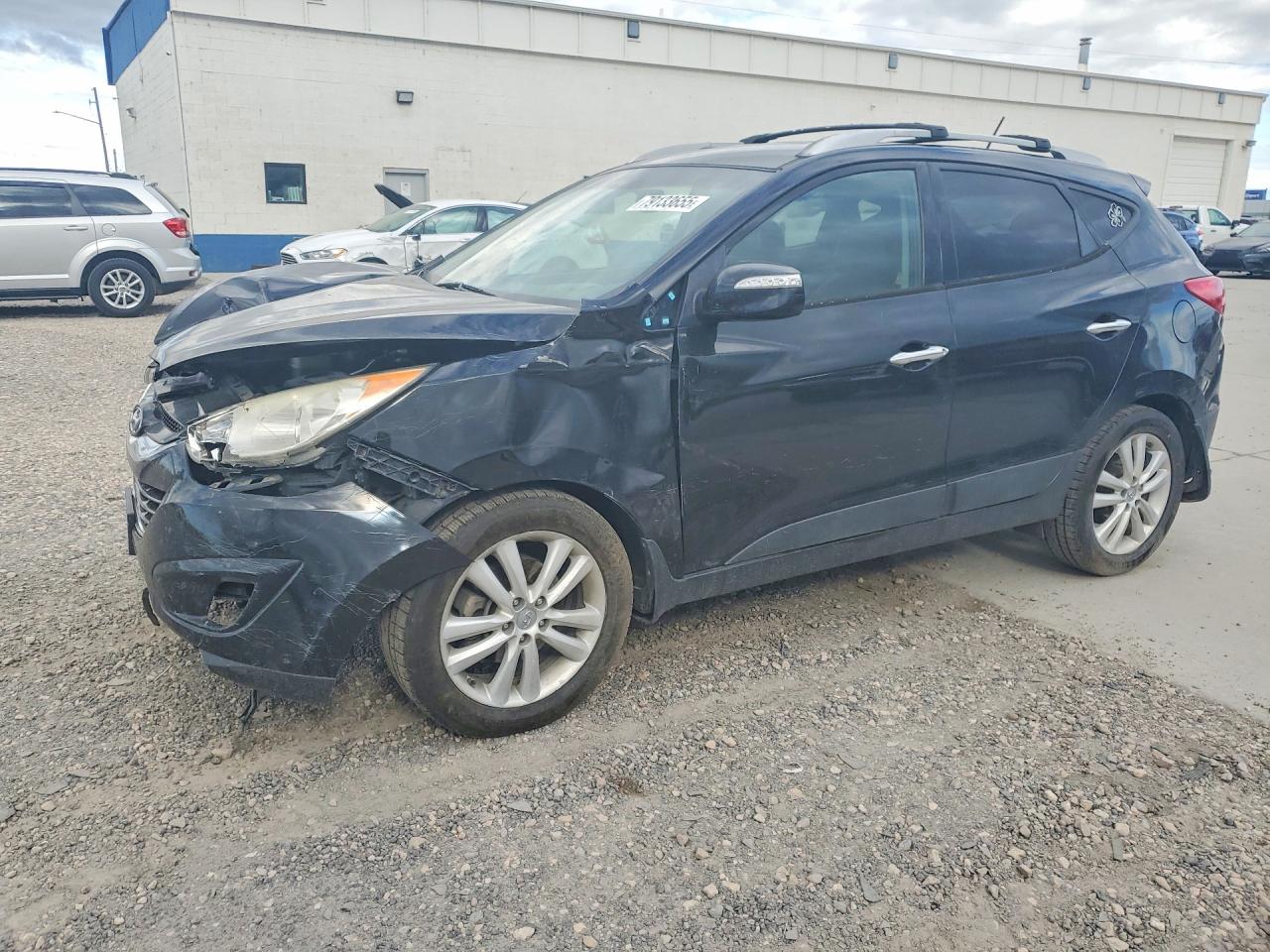 KM8JUCAC6BU291095 · 2011 HYUNDAI TUCSON