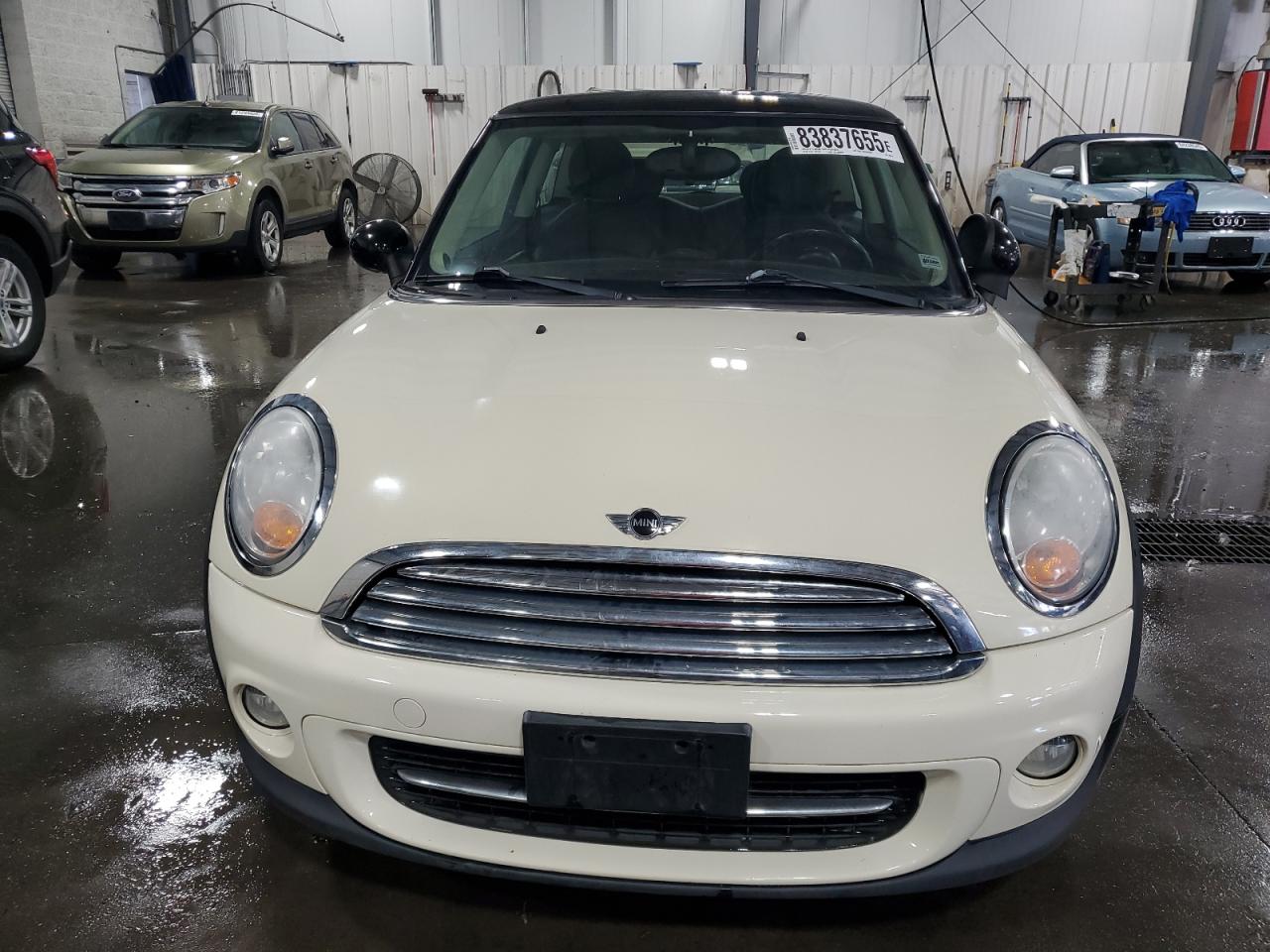 WMWSU3C50BT099519 · 2011 MINI COOPER · 5/12