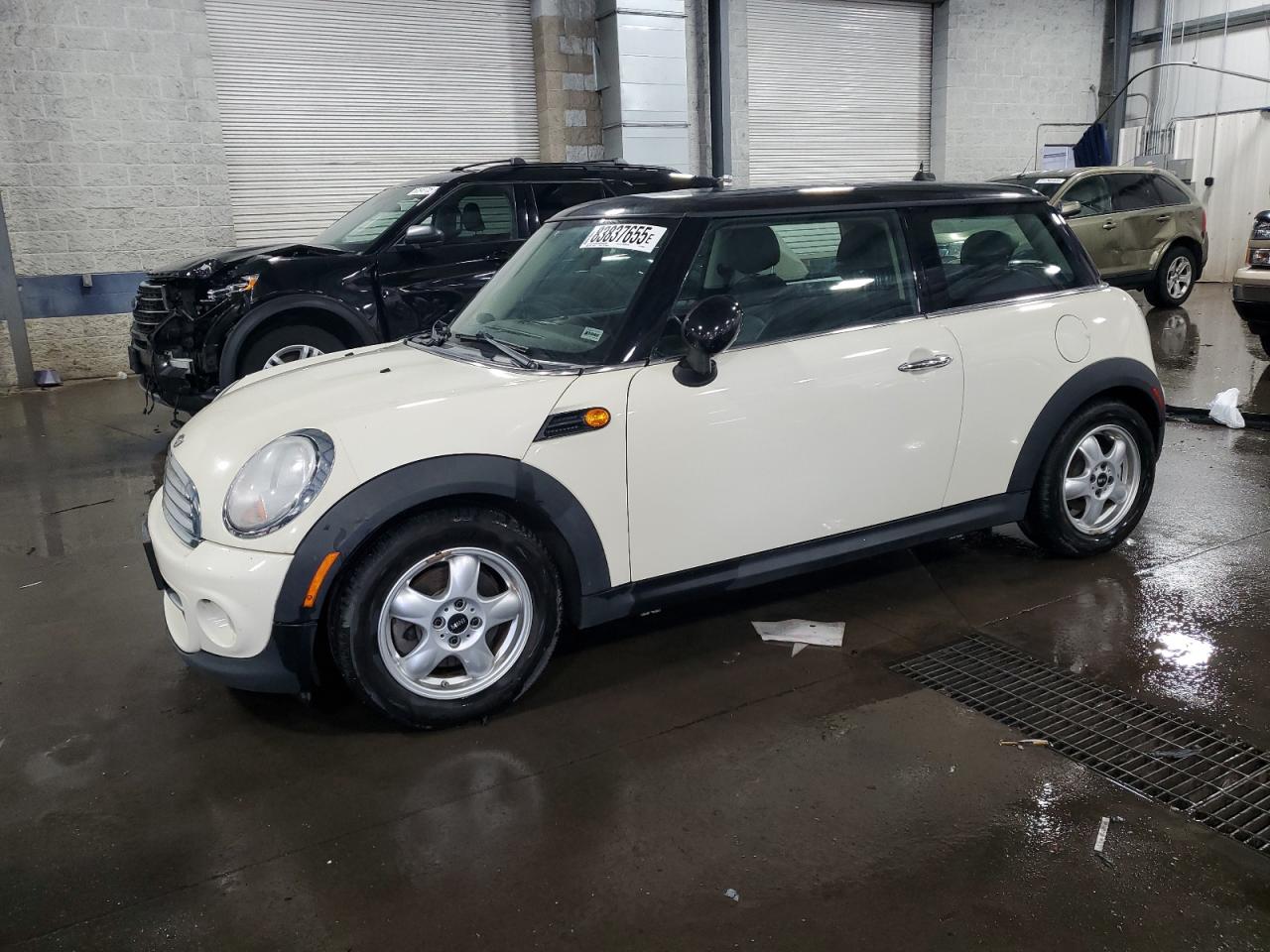 WMWSU3C50BT099519 · 2011 MINI COOPER