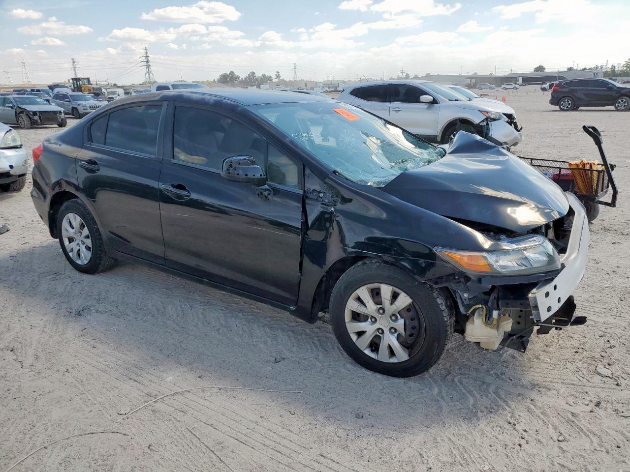 2HGFB2F50CH535818 · 2012 HONDA CIVIC LX · 4/12