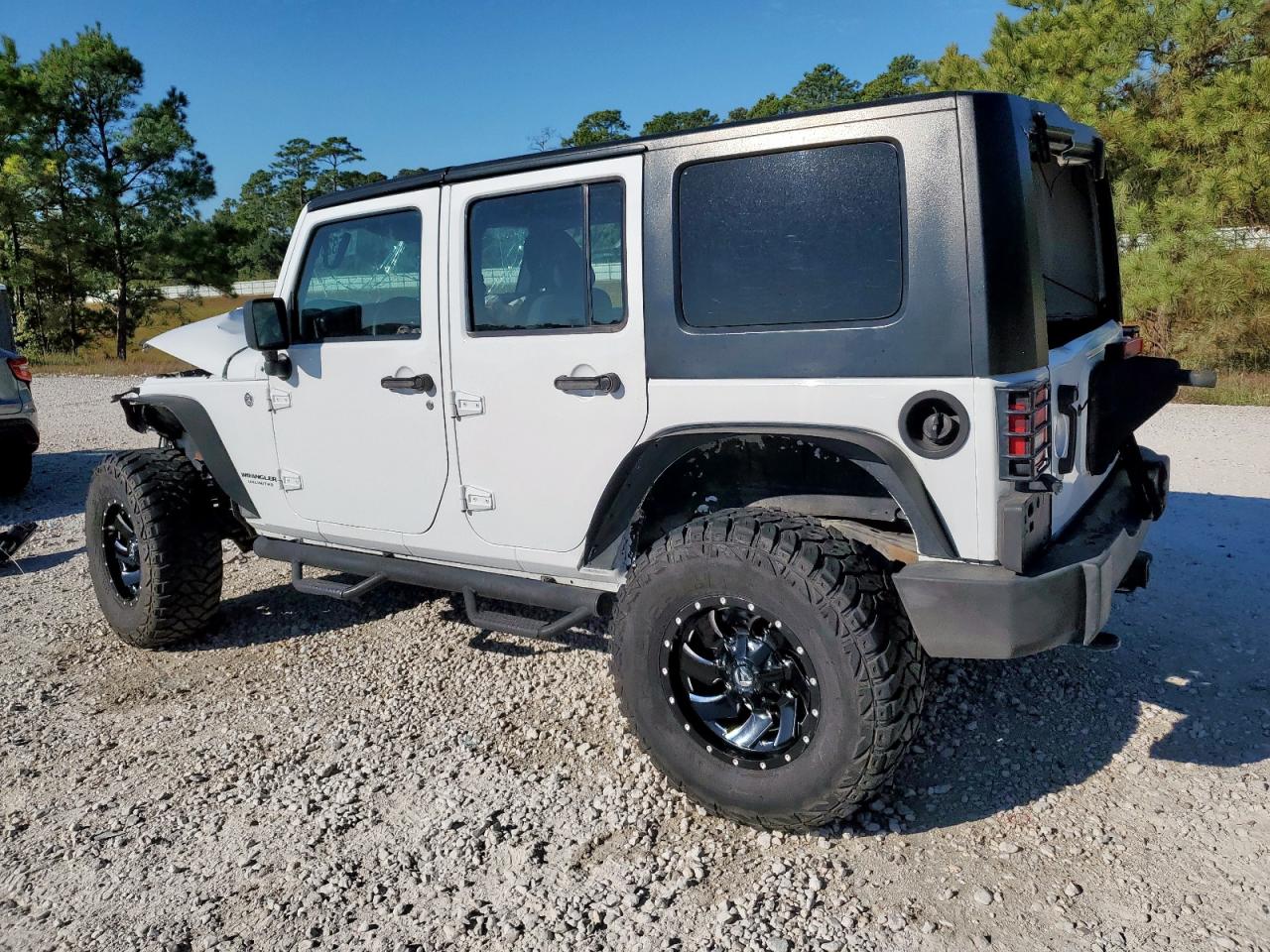 1C4BJWDG2FL723078 · 2015 JEEP WRANGLER UNLIMITED · 2/14