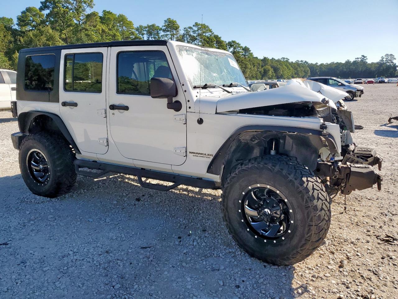 1C4BJWDG2FL723078 · 2015 JEEP WRANGLER UNLIMITED · 4/14